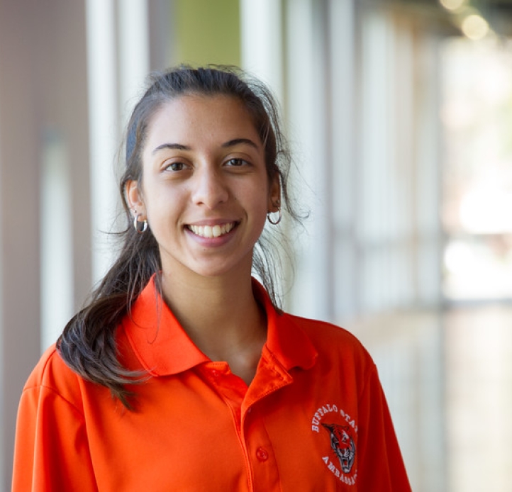 Student ambassador in hallway of Science and Mathematics Complex