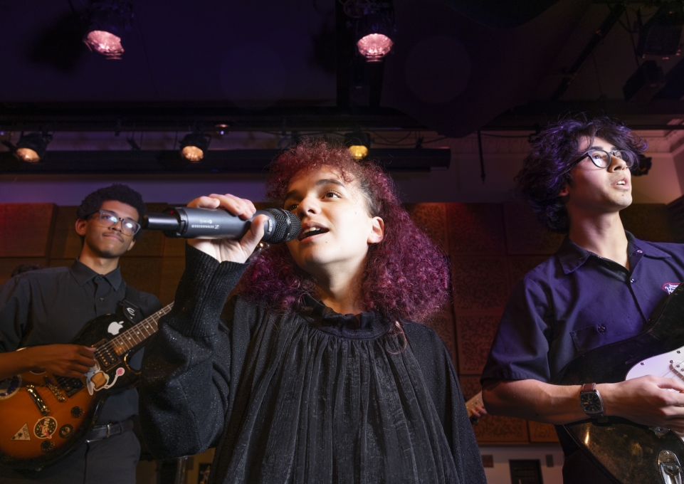 music student singing in microphone